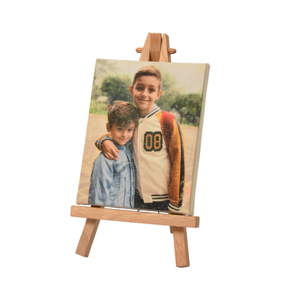 Mini tela personalizzata FotoGrafica con foto di due bambini su cavalletto in legno per decorazione da tavolo