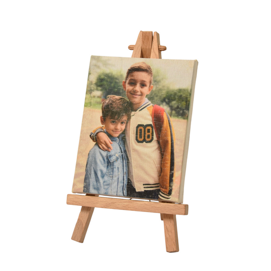 Mini tela personalizzata FotoGrafica con foto di due bambini su cavalletto in legno per decorazione da tavolo