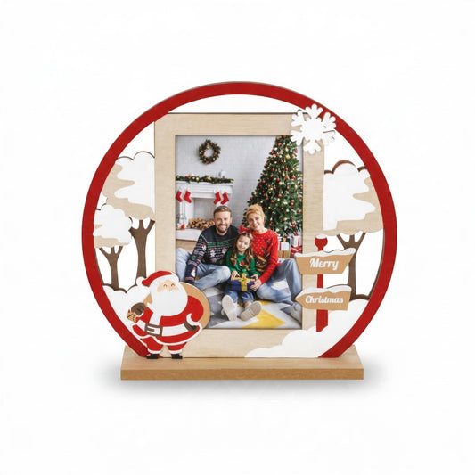 Cornice natalizia da tavolo FotoGrafica in legno con Babbo Natale e decori invernali per foto 10x15 cm