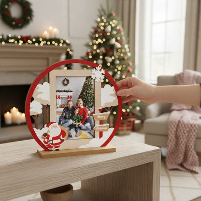 Cornice natalizia da tavolo FotoGrafica in legno con Babbo Natale e decori festivi per foto 10x15 cm
