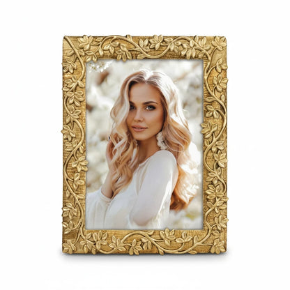 Cornice portafoto da tavolo FotoGrafica color oro con elegante decorazione a rilievo di foglie e rami intrecciati