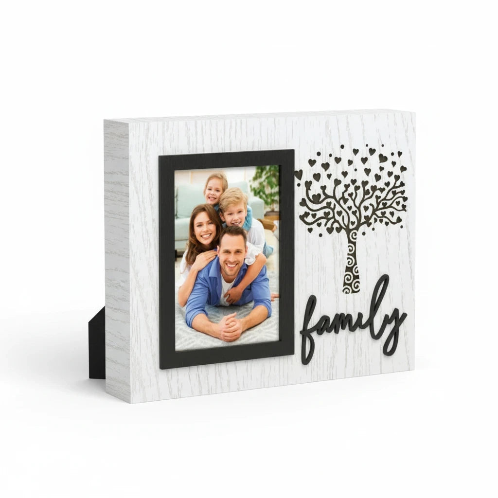 Cornice da tavolo FotoGrafica in legno bianco con albero decorativo, scritta family e portafoto nero per famiglia