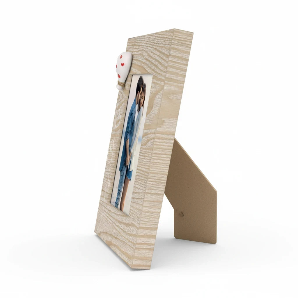 Cornice da tavolo FotoGrafica in legno chiaro con decorazione a cuore, ideale per foto romantiche