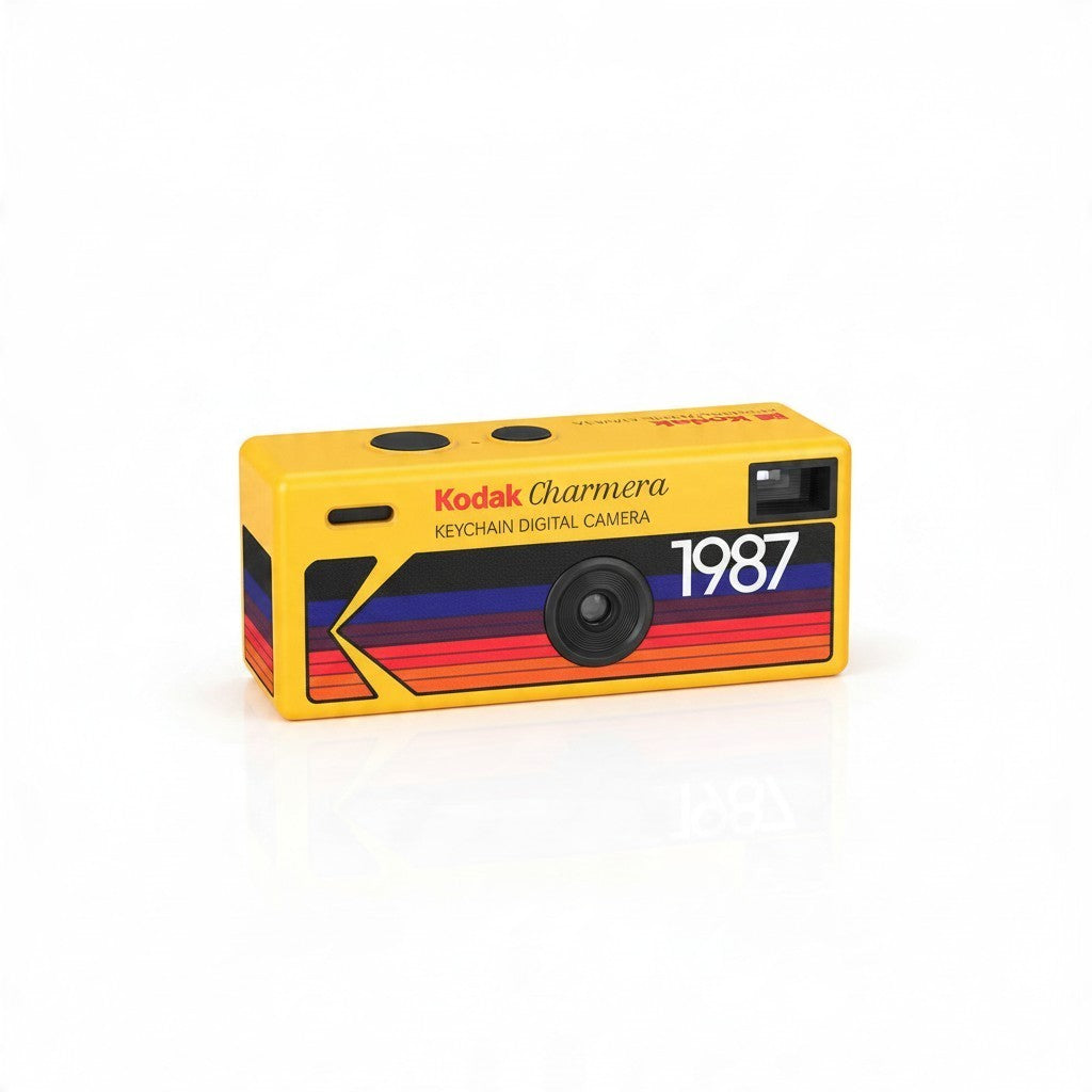 Fotocamera digitale portachiavi FotoGrafica Kodak Charmera gialla con design vintage a strisce colorate