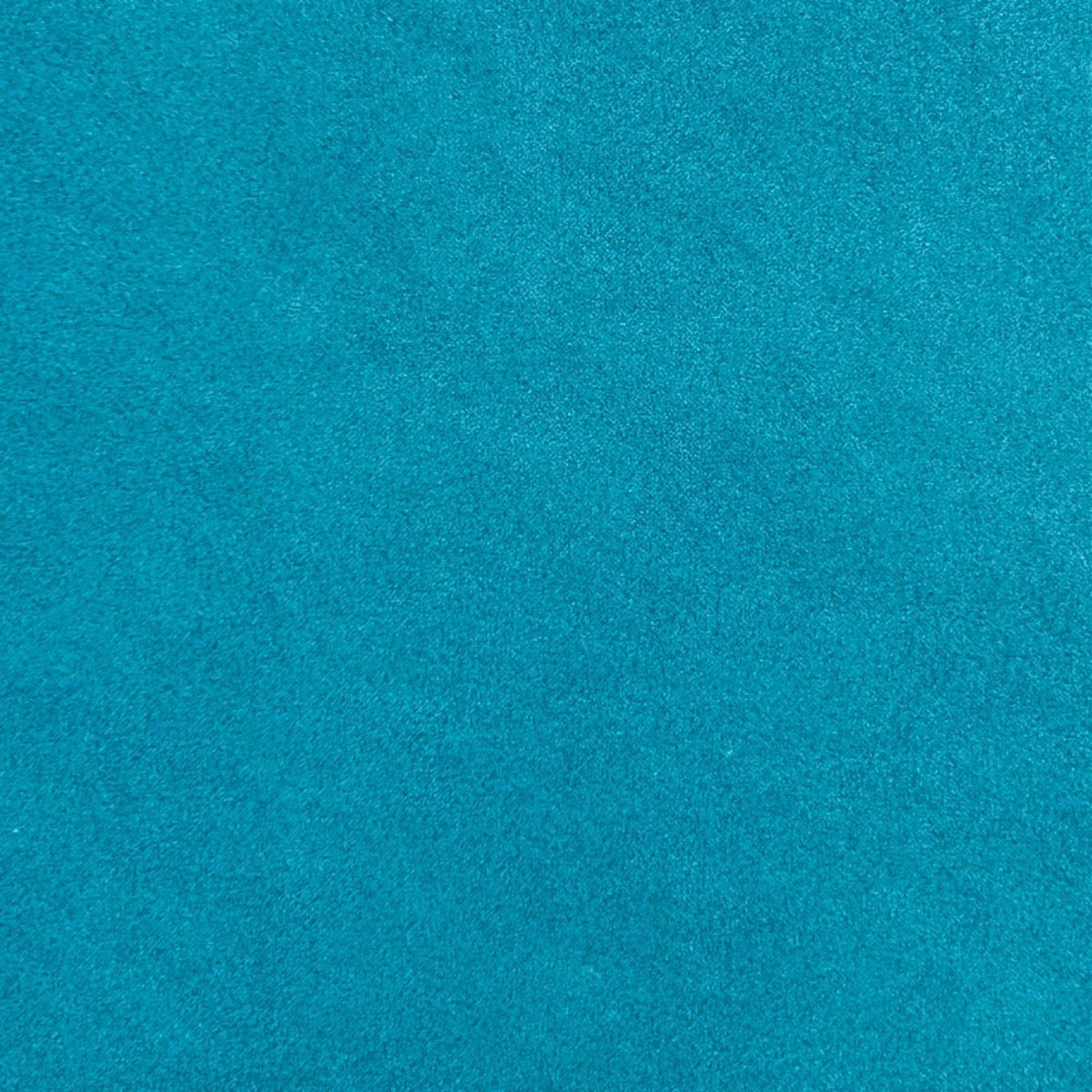 Dettaglio della texture in velluto color turchese brillante per la copertina del fotolibro FotoGrafica Sweet Book