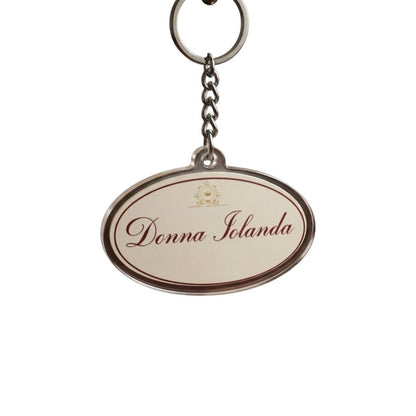 Portachiavi personalizzato FotoGrafica di forma ovale con scritta Donna Iolanda, elegante accessorio in metallo